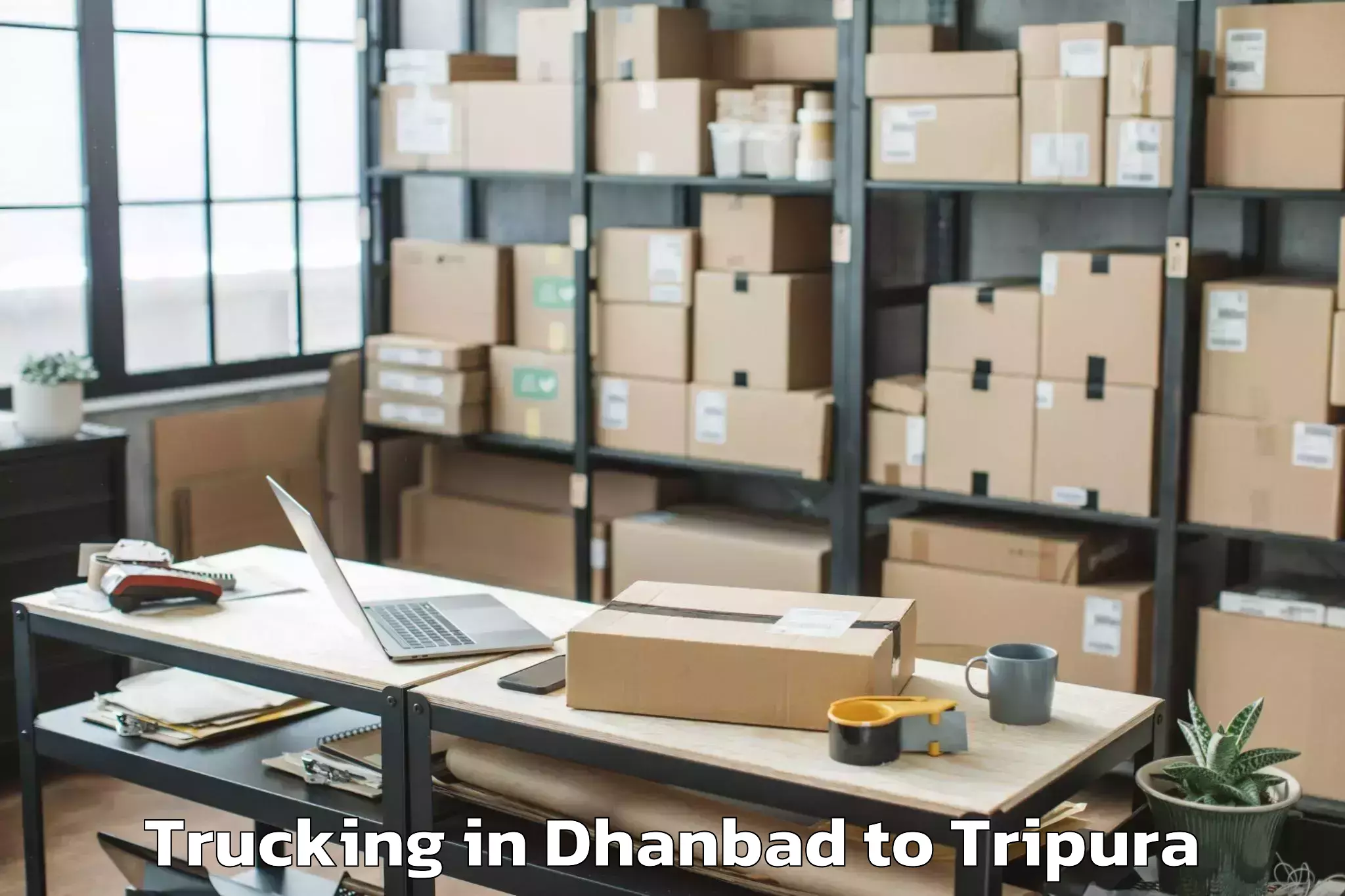 Get Dhanbad to Kamalpur Airport Ixq Trucking